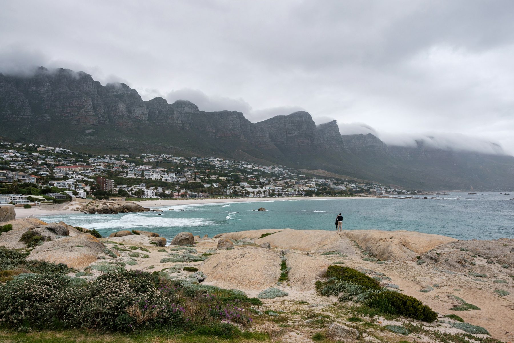 Camps Bay beach with the Twelve Apostles mountain range rising behind